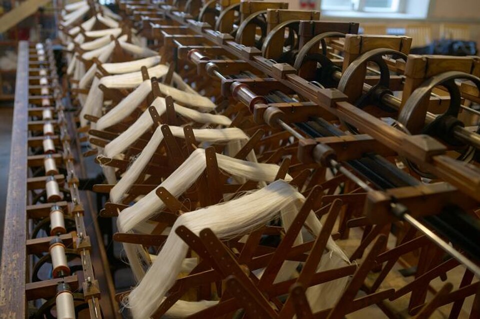 A photograph of K A Almgren silk weaving