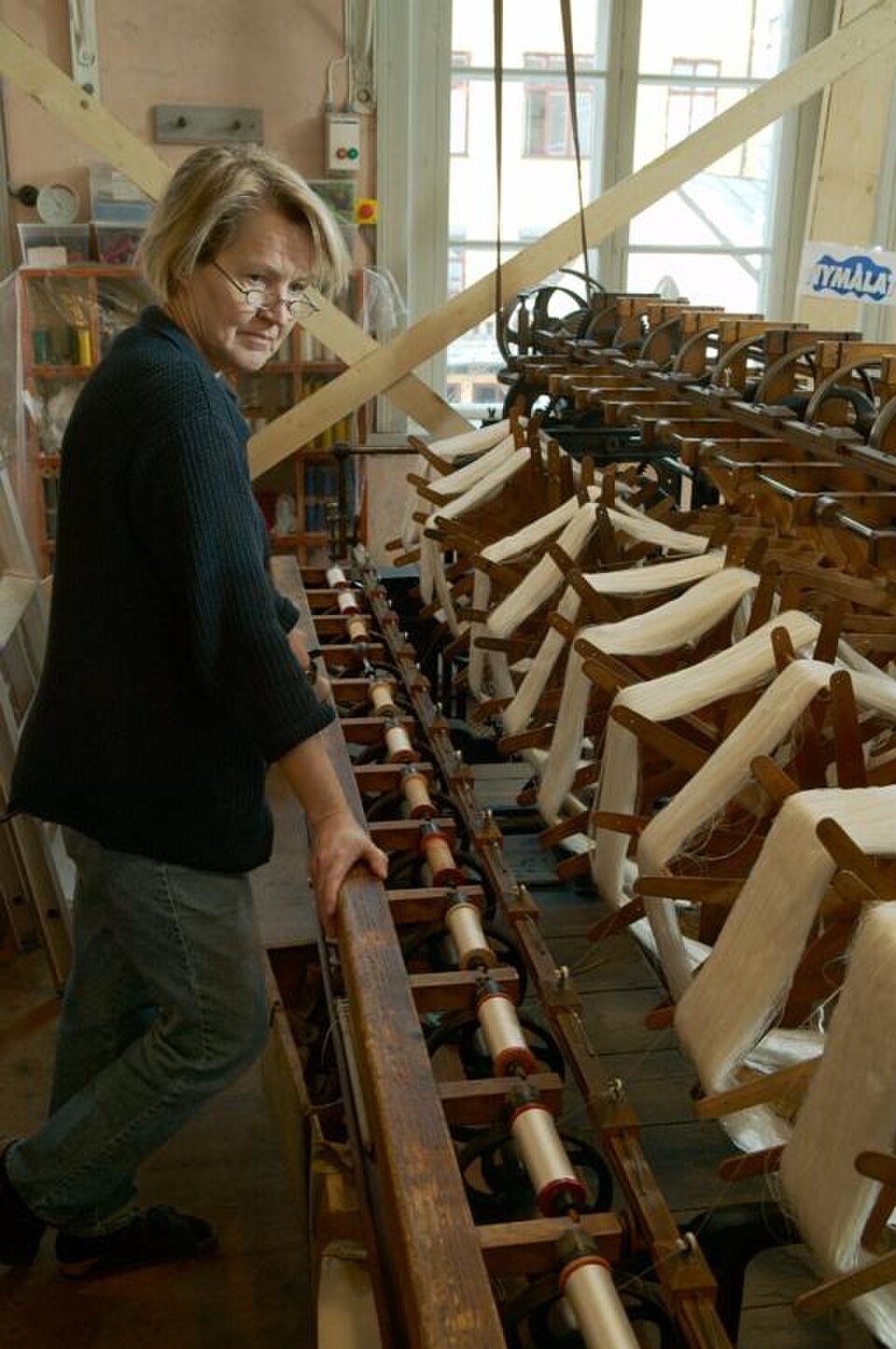 A photograph of K A Almgren silk weaving