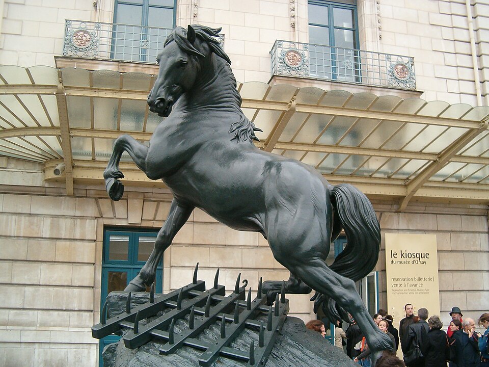 A photograph of Horse with Harrow