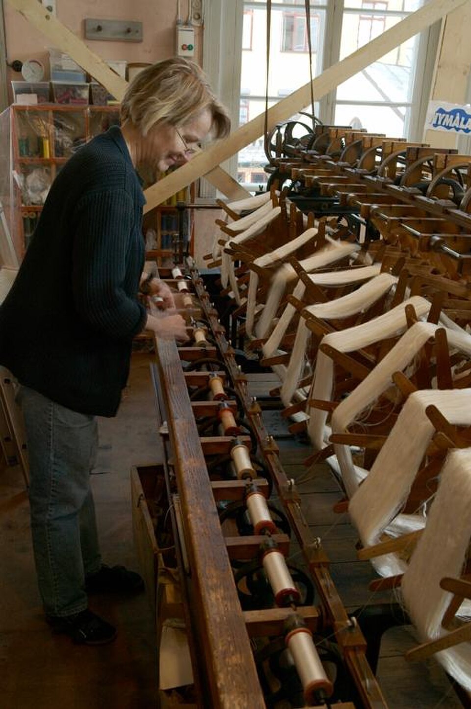 A photograph of K A Almgren silk weaving